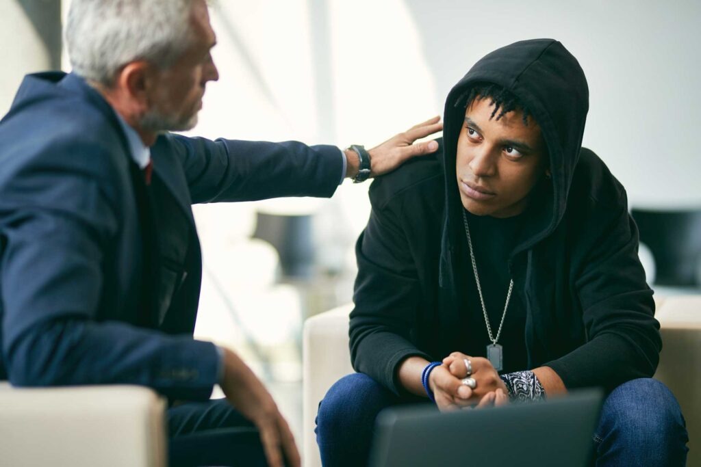 Young alt man receiving therapy for selective mutism.