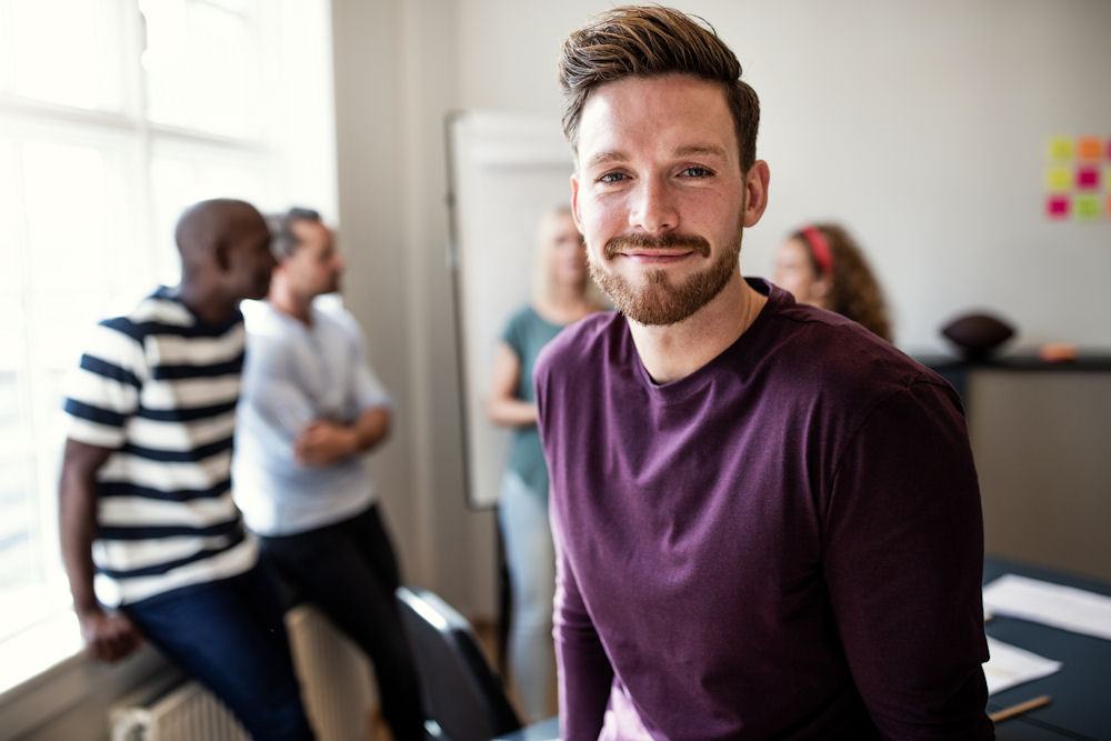 Man looking out from OCD support group.